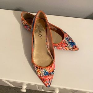 Adorable pair of Mari A flats in a sateen material in orange and navy and blues